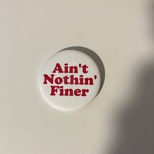 White Button with Red Text